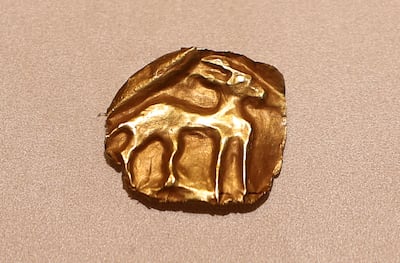 A gazelle carved into gold. Chris Whiteoak / The National