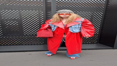 One visitor in a waistcoat made out of jeans over a bright red coat. Extra points for the buckled shoes