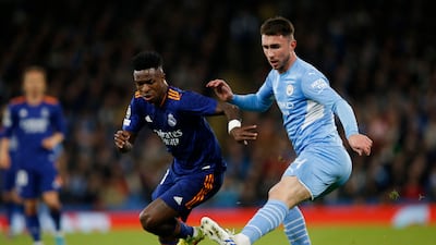 Aymeric Laporte - 5: Should have closed down Vinicius Junior before Brazilian's goal. Found himself in centre-forward’s position after 68 minutes but hit shot straight at Ederson. Blatant handball to give away penalty and allow Benzema to score from spot to make it 4-3. Reuters
