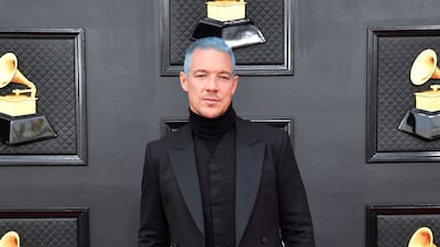 Diplo, wearing a black tuxedo over a turtleneck. AFP