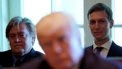 Former chief strategist Steve Bannon, left, and Jared Kushner, right, at a meeting with US president Donald Trump shortly before Mr Bannon left the White House under a cloud / Reuters