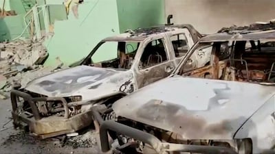 A still from a video shows destroyed security vehicles in Ghazni City. Ariana News via Reuters