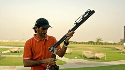 UAe Olympic shooting gold medalist Sheikh Ahmed bin Hasher has decided to start a shooting academy to 'give back to the country' by developing future Emirati Olympic shooting stars. Marwan Naamani / AFP
