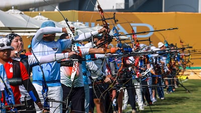 Competitors take aim during the archery event. The multi-sports event has attracted more than 20,000 athletes to the UAE. Victor Besa / The National