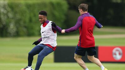 England’s Raheem Sterling and James Milner during training. Reuters / Matthew Childs