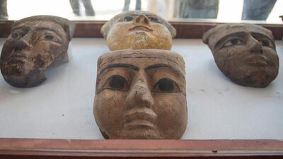 Pharaonic masks are displayed in Saqqara, south of Cairo. EPA