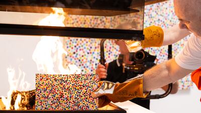 Over the course of Frieze week, Damien Hirst will burn more than 4,851 physical artworks which correspond to the NFTs that collectors decided to keep. Getty Images