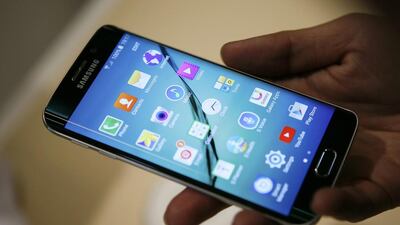 The allure of smartphones, such as this Samsung model, is often too much for people to ignore. Albert Gea / Reuters