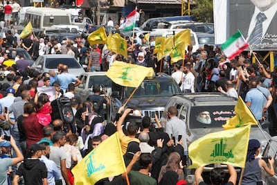 Hezbollah supporters rally as a convoy of tanker trucks carrying Iranian fuel oil arrive in Baalbeck. Reuters