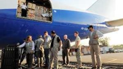 Princess Haya bint Al Hussein, left, wife of Sheikh Mohammed bin Rashid, Vice President of the UAE and Ruler of Dubai, arrives in Haiti.