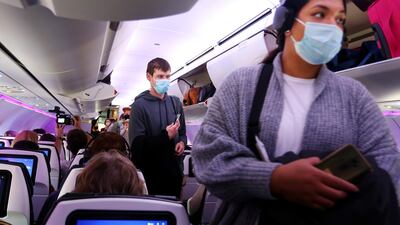 In Sydney, Australia, passengers board Air New Zealand Flight 246 bound for Wellington. Getty