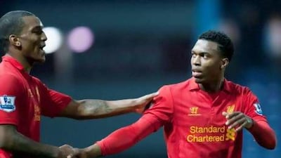 Daniel Sturridge, right, is hopeful of a better atmosphere and settle down at Liverpool. Jon Super / AP Photo