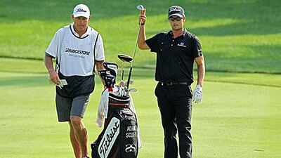 It is not often that a caddie gets more acclaim than a golfer at a tournament, but Steve Williams, left, Adam Scott's caddie, shows that he can guide not just Tiger Woods to victory at the WGC-Bridgestone Invitational in Akron.