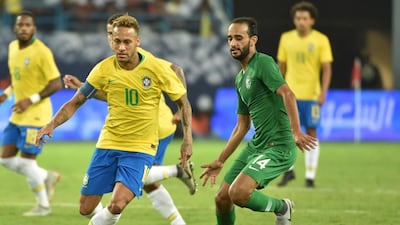 Brazil forward Neymar takes on the Saudi Arabia defence. AFP
