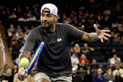 Nick Kyrgios of Australia returns a shot playing with Naomi Osaka of Japan against Aryna Sabalenka and Tommy Paul of the United States in a mixed doubles match during the Garden Cup at Madison Square Garden. AFP