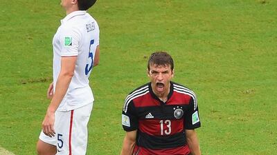 Thomas Muller of Germany celebrates scoring his team's goal on Thursday in their 1-0 win over the US at the 2014 World Cup in Recife, Brazil. Germany finished atop Group G. Laurence Griffiths / Getty Images