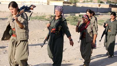 While some women are joining the "jihadis", these women from the Kurdistan Workers Party are fighting against ISIL because the extremist group "is against women's liberation". Ahmad Al Rubaye / AFP