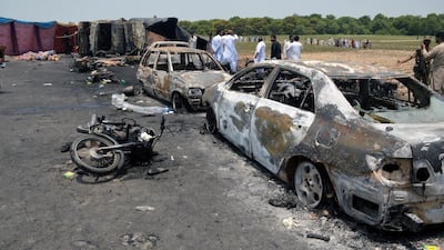 Burnt out cars and motorcycles are seen at the scene of an oil tanker explosion in Bahawalpur, Pakistan. Reuters