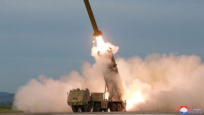 The test-firing of a 'newly developed super-large multiple rocket launcher' at an undisclosed location was supervised by North Korean leader Kim Jong Un. AFP