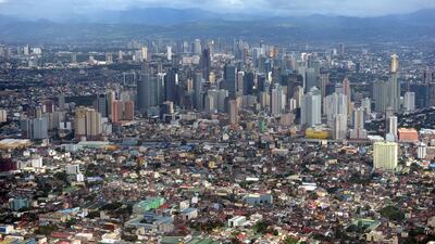 An aerial shot of Manila. The Philippine economy could grow between 6.5 and 7.5 per cent this year, the government said. Ted Aljibe / AFP