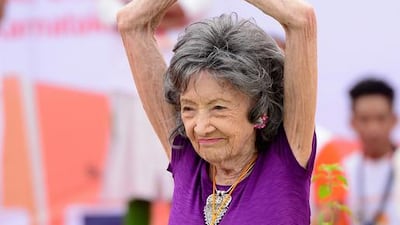 Yoga master Tao Porchon-Lynch, 98, takes part in a mass yoga session on International Yoga Day at the Shree Kanteerava Stadium in Bangalore. Manjunath Kiran / AFP