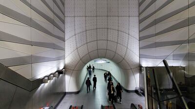 Commuters walk to the Elizabeth Line at the Liverpool Street underground station, in London. The route has been awarded the 2024 RIBA Stirling Prize. EPA