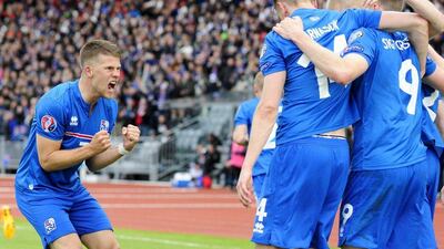 Iceland's Kolbeinn Sigthorssonn No 9 on the right, celebrates with teammates during their Euro 2016 qualifying win over Johann Gudmundsson on Friday. Sigtryggur Johansson / Reuters / June 12, 2015