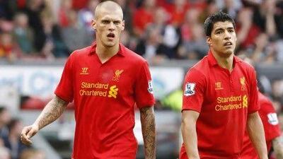 Liverpool’s Luis Suarez and Martin Skrtel after the 2-0 loss to Arsenal, they have only won one point in the first three games.