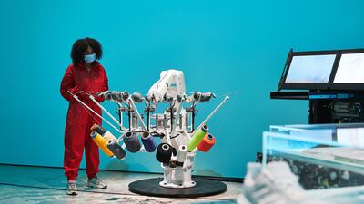 Created by Kram/Weisshaar for Adidas, this robot can make sneakers.