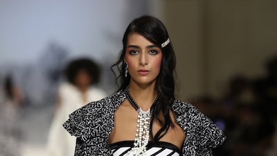 Nora Attal walks in the Chanel cruise 2021-22 show in Dubai