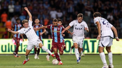 Egyptian footballer Mohamed Salah, centre, runs with the ball on his Turkish Super League debut for Trabzonspor against Kasimpasa SK in Istanbul. The match ended 1-1. Getty Images
