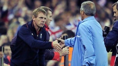Stuart Pearce, left, the Team GB coach, is desperate for a win, more for the players than himself. Glyn Kirk / AFP