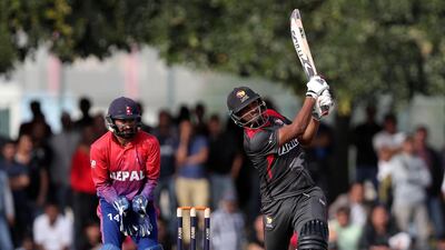 Amir Hayat of the UAE scores a 6 to win the match. Chris Whiteoak/The National