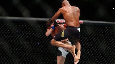 LONDON, ENGLAND - FEBRUARY 27: After knocking out Silva's gumshield Michael Bisping of Great Britain (L) stops fighting Anderson Silva of Brazil but Silva fights on without his gumshield and knocks Bisping to the ground with his knee during the Middleweight Bout of the UFC Fight Night at The O2 Arena on February 27, 2016 in London, England. (Photo by Christopher Lee/Getty Images)