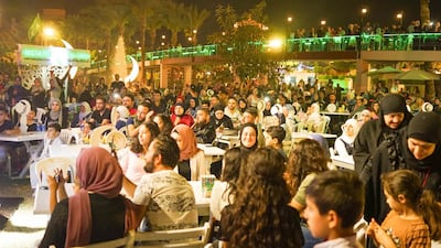 Crowds gather to enjoy music and traditional entertainment at the Ramadan village, Tripoli. Photo: Olivia Cuthbert