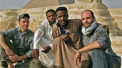 Americans archaeologist Will Raynolds (far left) was working in Libya and forced to leave and journalist Joshua Maricich (far right) was kicked out of Yemen. They bought a "felucca" (traditional Nile river boat) and named it Jasmine. Their two African crew members pose with them.