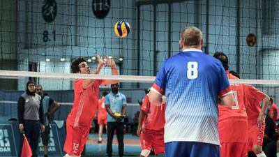 Volleyball match at Adnec. UAE vs USA. Mohamad Al Bonni dives to save the ball.