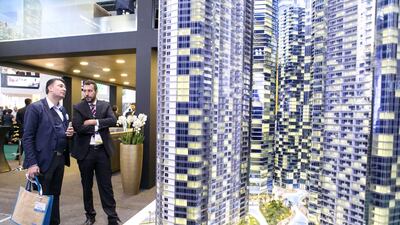 Visitors at Akon City’s stand at the Arabian Travel Market. Reem Mohammed / The National