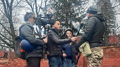 Cameraman Pierre Zakrzewski, US journalist Trey Yingst and Ukrainian journalist Oleksandra "Sasha" Kuvshynova reporting in Ukraine. Fox News / AFP