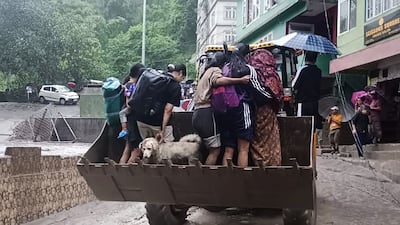 Residents being evacuated in Muguthang, India. AFP