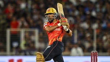 Punjab Kings batter Shashank Singh plays a shot during the 2025 IPL final against Royal Challengers Bengaluru. AFP
