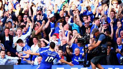 Chelsea's Eden Hazard celebrates scoring the opening goal during their Premier League match against Manchester United at Stamford Bridge on April 18, 2015. Ian Walton / Getty Images