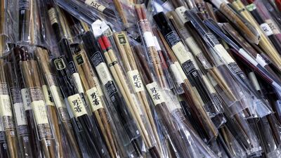 Fast-food chain showed a video clip of diners trying to eat its new “Vietnamese Sweet Chilli Tendercrisp Burger” with large red chopsticks. Bloomberg