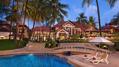 The hotel has a large outdoor swimming pool and Jacuzzi, as well as badminton, tennis and volleyball courts. Courtesy Dusit Thani