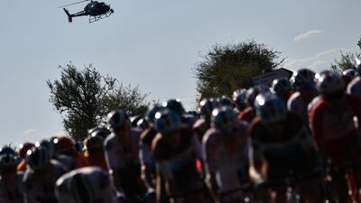 A helicopter hovers over the peloton during the 167km Stage 11 between Chatelaillon Plage and Poitiers. AFP