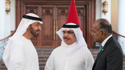 The Crown Prince of Abu Dhabi speaks with Sheikh Rashid bin Abdullah, Minister of Interior of Bahrain, centre, and K Shanmugam Singapore's Minister for Home Affairs & Law during a Sea Palace barza. Ryan Carter for the Crown Prince Court - Abu Dhabi