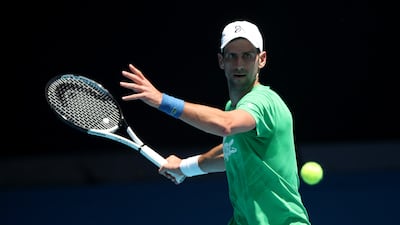 Novak Djokovic plays a forehand during a practice session. Getty