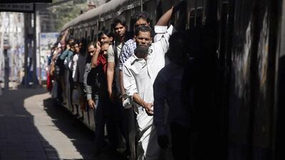Indian Railways runs 19,000 trains a day, of which 12,000 carry more than 23 million passengers and 7,000 carry 3 million tonnes of freight. Rajanish Kakade / AP Photo