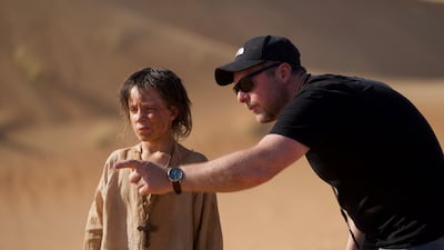 Child actor Ezra Carlisle and director Damien McCarthy on the set of Hokum in Abu Dhabi. Photo: Abu Dhabi Film Commission