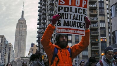 The Empire State Building is seen in the background while people march against police violence, in Midtown Manhattan, New York. Eduardo Munoz / Reuters